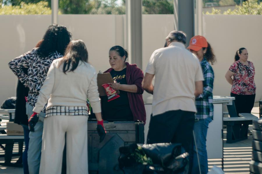 A facilitator walks participants through sorting materials.